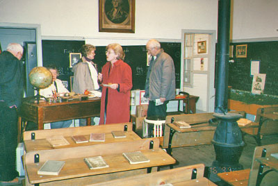 Adult visitors enjoy reading the class lessons
